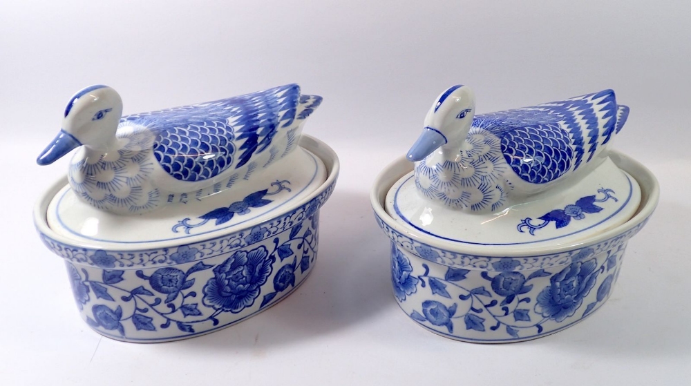 A pair of blue and white tureens with duck form lids, 24cm long