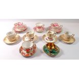 A collection of cabinet teacups and coffee cans including Copeland Spode, Hammersley etc.