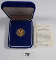An Elizabeth II Bermuda one hundred dollars gold coin to commemorate the Royal Visit Feb 16th
