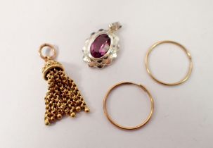 A yellow metal tassel pendant, a pair of 9 carat gold sleeper earrings and a silver and amethyst