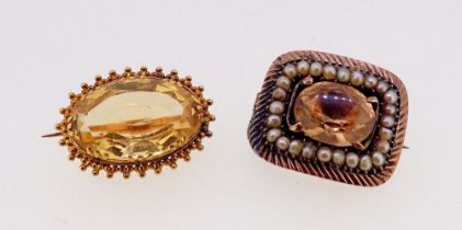 An oval gold and citrine brooch unmarked 21cm wide and an early 19th century mourning brooch set