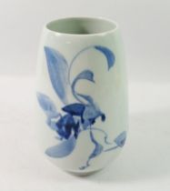 A Chinese 20th century 'Blue Shanghai White' floral painted vase, 18.5cm high, signed to base