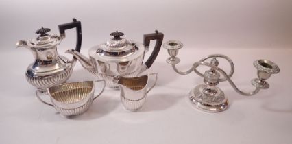 A Mappin & Webb three piece silver plated tea service, a coffee pot and candleabra