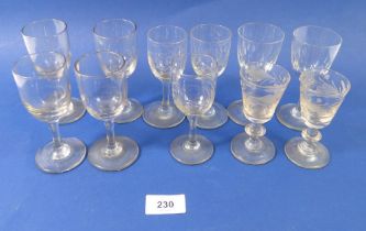 A collection of eleven antique drinking glasses including pair of 18th century cordial glasses