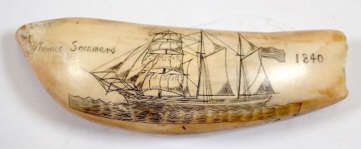 A whales tooth scrimshaw sailing ship decoration, 11cm long