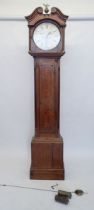 An 18th century oak longcase clock with swan neck pediment over silvered dial by Thomas Stacy of