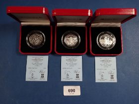 Three Pobjoy Mint Isle of Man silver proof Christmas fifty pences, 1994, 1995 and 1996, all cased