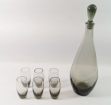 A Swedish smoked glass wine decanter and six glasses