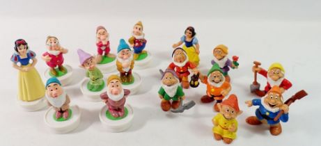 Two sets of Snow White and the Seven Dwarves figures by Disney and Rowntree