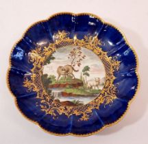 An early Worcester saucer painted by Jefferyes Hamett O'Neale depicting The Wolf and The Lamp from