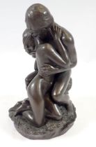 A resin statue of two lovers, 17cm tall