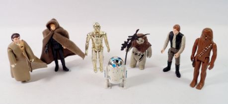 A group of seven loose vintage Star Wars figures Kenner/Palotroy include Luke Skywalker with cape