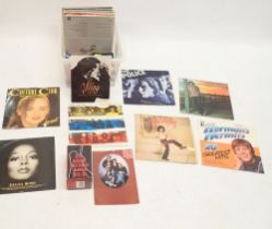 A group of thirty vinyl record albums including 70's, 80's music - Mike Oldfield, Cliff Richard etc.