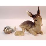 A Midwinter fawn and mother group and Lladro duck