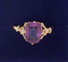 A Victorian gold amethyst ring on floral shoulders, 2g, size R-S