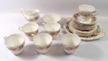 A Paragon tea service 'Country Lane' comprising six cups and saucers, six tea plates, cake plate,