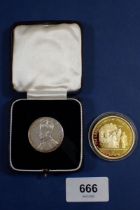 An Edward VIII coronation medal 1937 in fitted case plus an Elizabeth II 2000 Isle of Man silver one