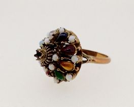 A 14k gold Eastern style domed ring set stone specimens and opals