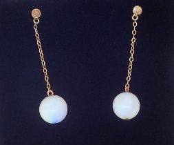 A pair of 18 carat gold and opal bead pendant earrings, 2.8cm drop