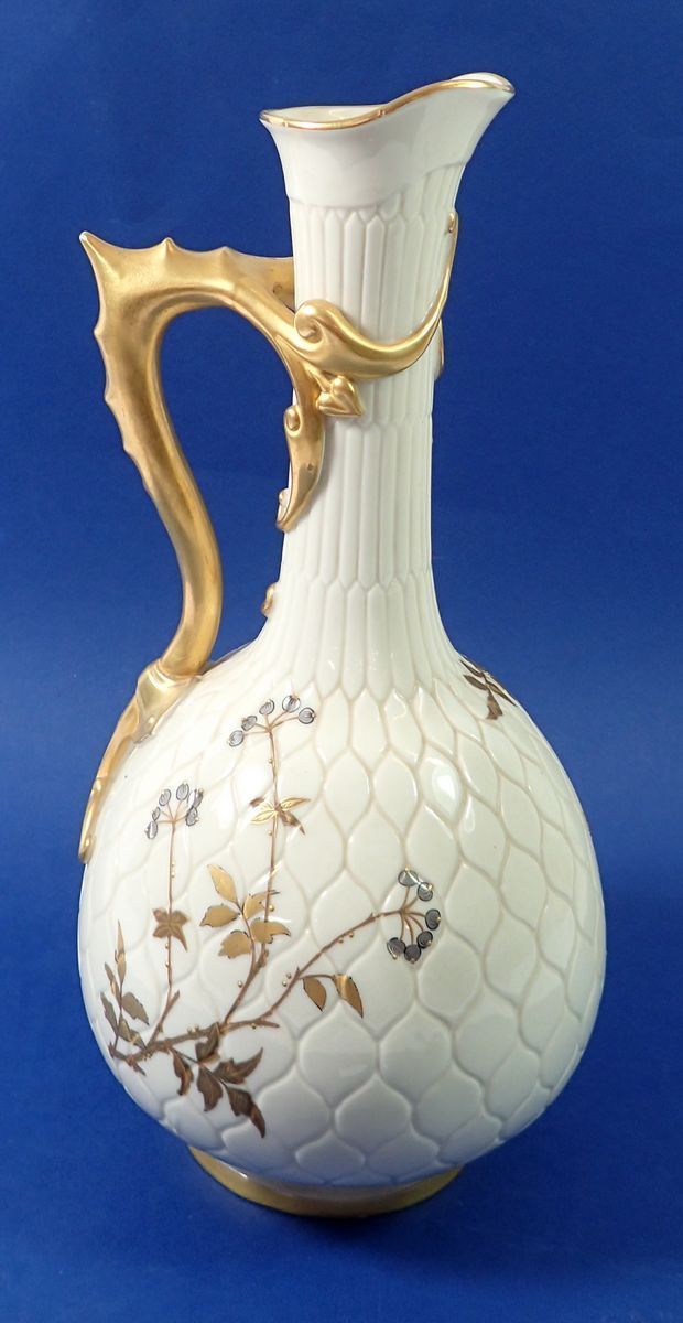 A Victorian Royal Worcester large ivory and gilt jug with trailed stem and leaf handle, painted gilt - Image 2 of 3
