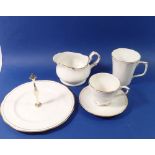 A Duchess gilt and white tea, coffee and dinner service comprising six tea cups and saucers, six