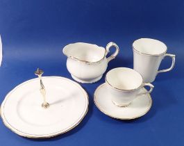 A Duchess gilt and white tea, coffee and dinner service comprising six tea cups and saucers, six