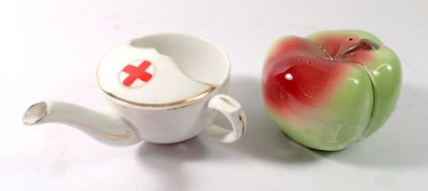 A WWI Red Cross invalid cup and a novelty apple cruet