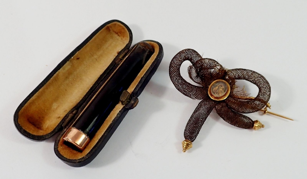 A Georgian woven hair and yellow metal Momento Mori brooch, 5cm across a/f and a 9ct gold mounted