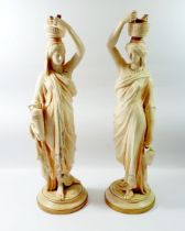 A pair of Victorian Royal Worcester large blush ivory figures of Grecian water carriers, date code