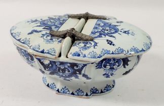 An antique Delft oval two section box with hinged lids, possibly for spice, 13cm