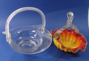 A Victorian frilled orange and yellow glass basket and a clear glass one with air twist handle, 27 x