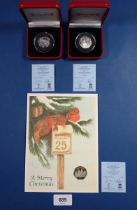 Three Pobjoy Mint Isle of Man silver proof Christmas fifty pences 2000 and 2002 cased plus 2001