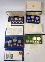 A group of five coin sets including Franklin Mint Guyana 1977 proof set, 10 dollar sterling