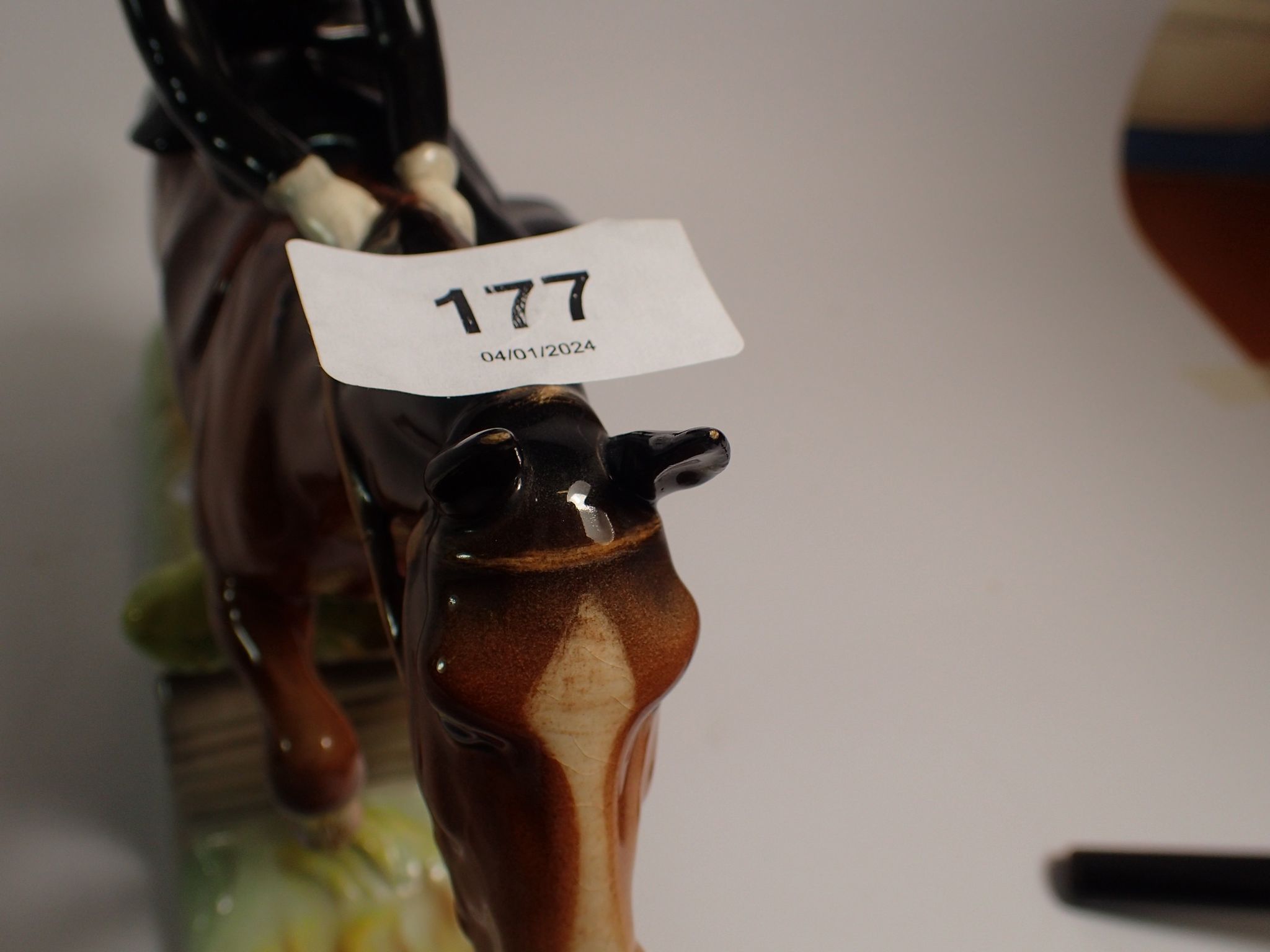 A Beswick huntswoman riding side saddle, taking a fence - Image 3 of 3