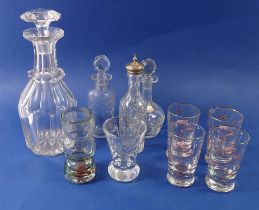 A cut glass decanter, four novelty pig ladies and gentlemen drinks measures and three other cut