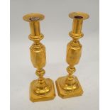 A pair of large brass candlestick with pushers, 35cm