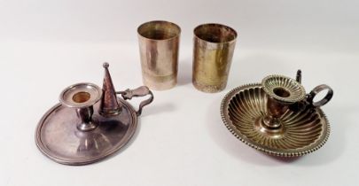 Two silver plated chamber sticks and two tumblers