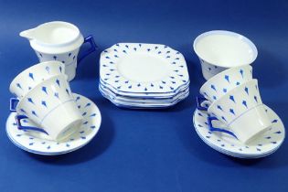 A Colclough part Art Deco tea service with blue diamond decoration comprising four cups and saucers,