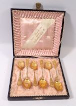 A set of six silver gilt coffee spoons - unmarked