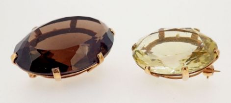 Two 9 carat gold brooches set citrine and smokey quartz, 4cm x 3cm wide each