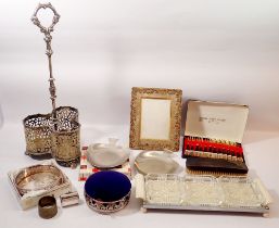A box of silver plated items including a three bottle decanter, pin cushion, Zimco tray etc.