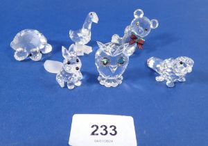A group of Swarovski glass animals: tortoise, owl, parrot, teddy, goose and fox - all boxed