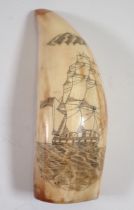 A whales tooth scrimshaw sailing ship decoration, 12cm long