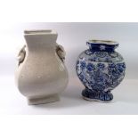 A Chinese blue and white large floral vase, 31cm tall and a crackle glaze one