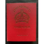 Red Stanley Gibbons KGVI stamp album of mint definitives, commemoratives, officials and postage due,