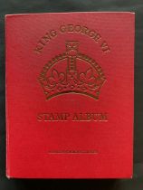 Red Stanley Gibbons KGVI stamp album of mint definitives, commemoratives, officials and postage due,