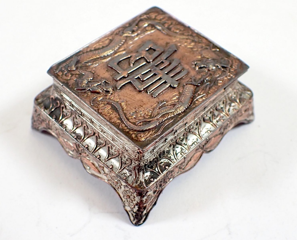 A Chinese metal stamp box with longevity symbol to lid, 5.5cm wide