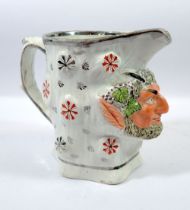 A 19th century Staffordshire Pearlware Bacchus jug, 16cm