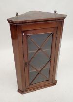 A mahogany astragal glazed small corner cupboard, 84cm tall