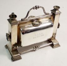 A novelty Edwardian silver plated cigarette dispenser and lighter in the form of a breakfast